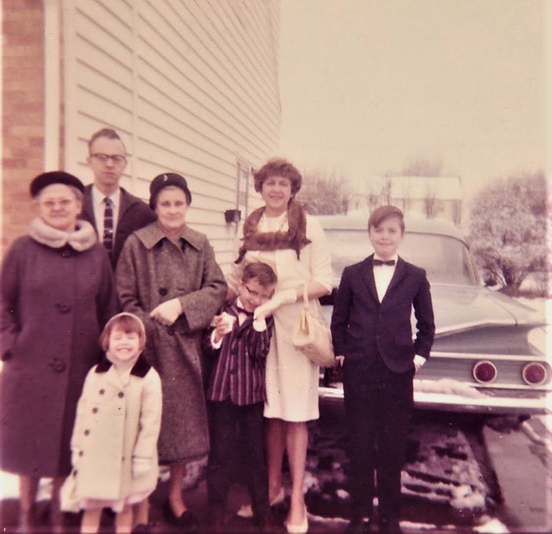 Larry and his family with his grandmothers at the South Huxley house, 1965
