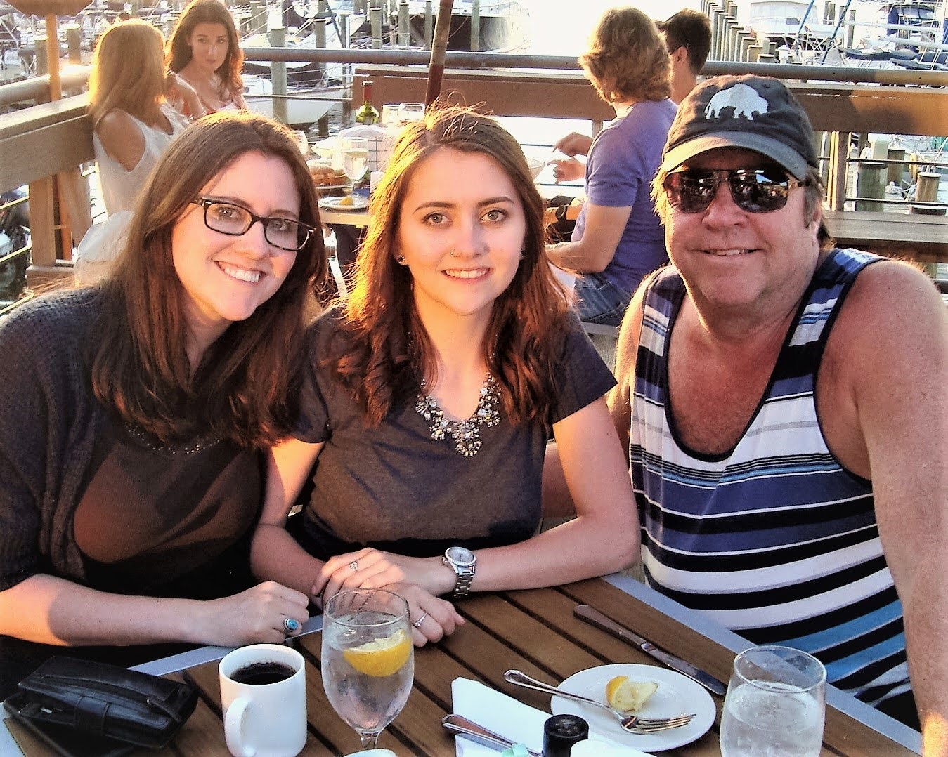 Larry at a Maryland marina restaurant with his daughters Christina and Kim, 2017