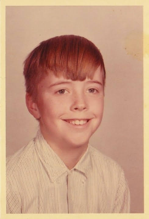 Larry's school portrait, around age 10, 1965
