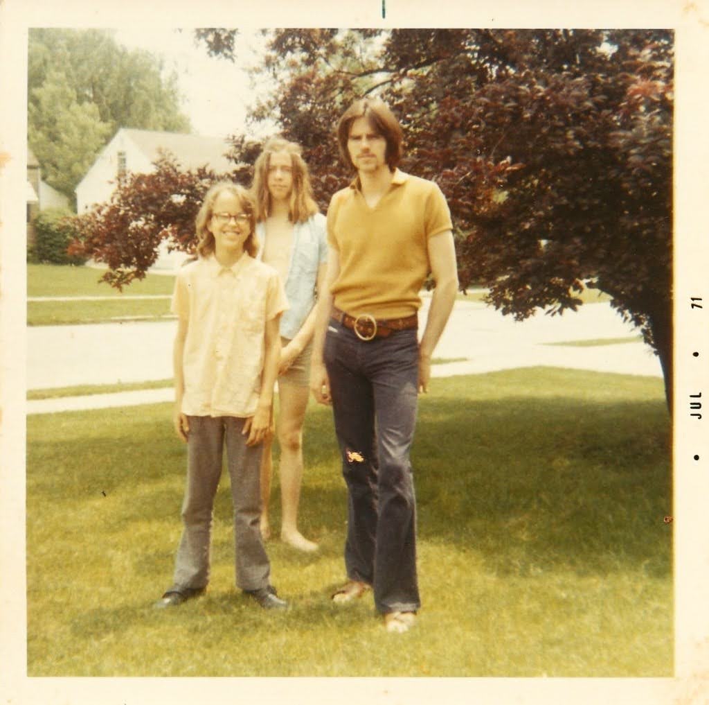 Mark, Larry, and Rick in the front yard
