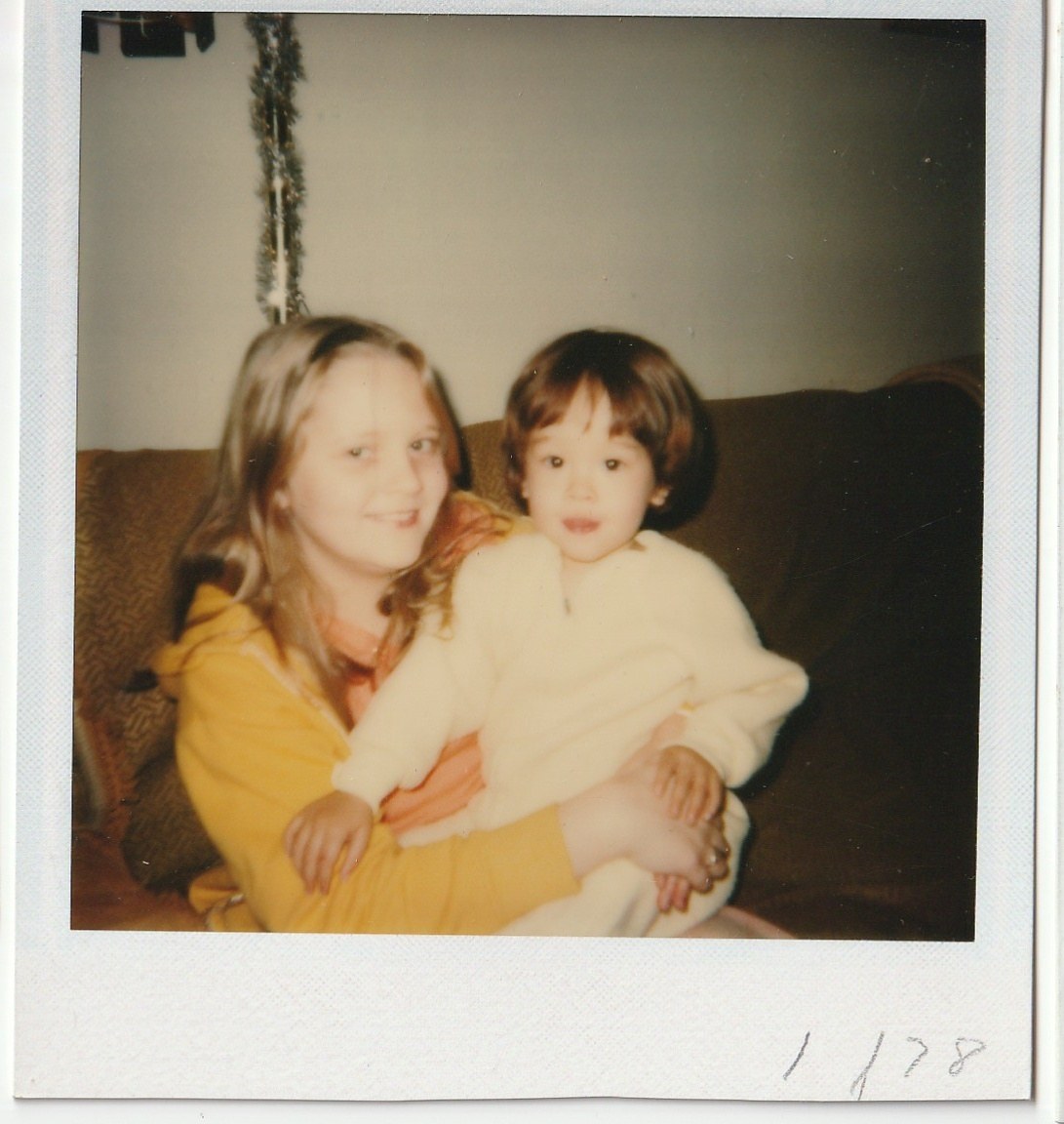 Michelle (Mike's daughter) holding baby Kyle (Pam's son)