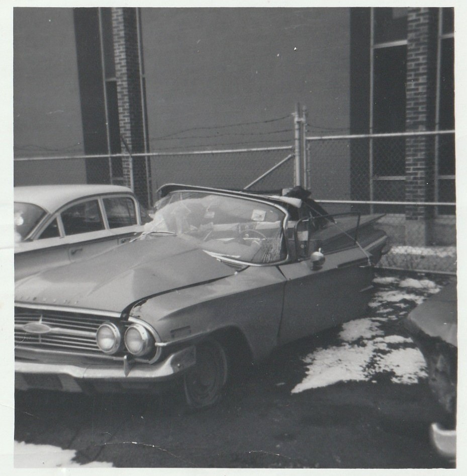 Rosa's wrecked car in the impound lot
