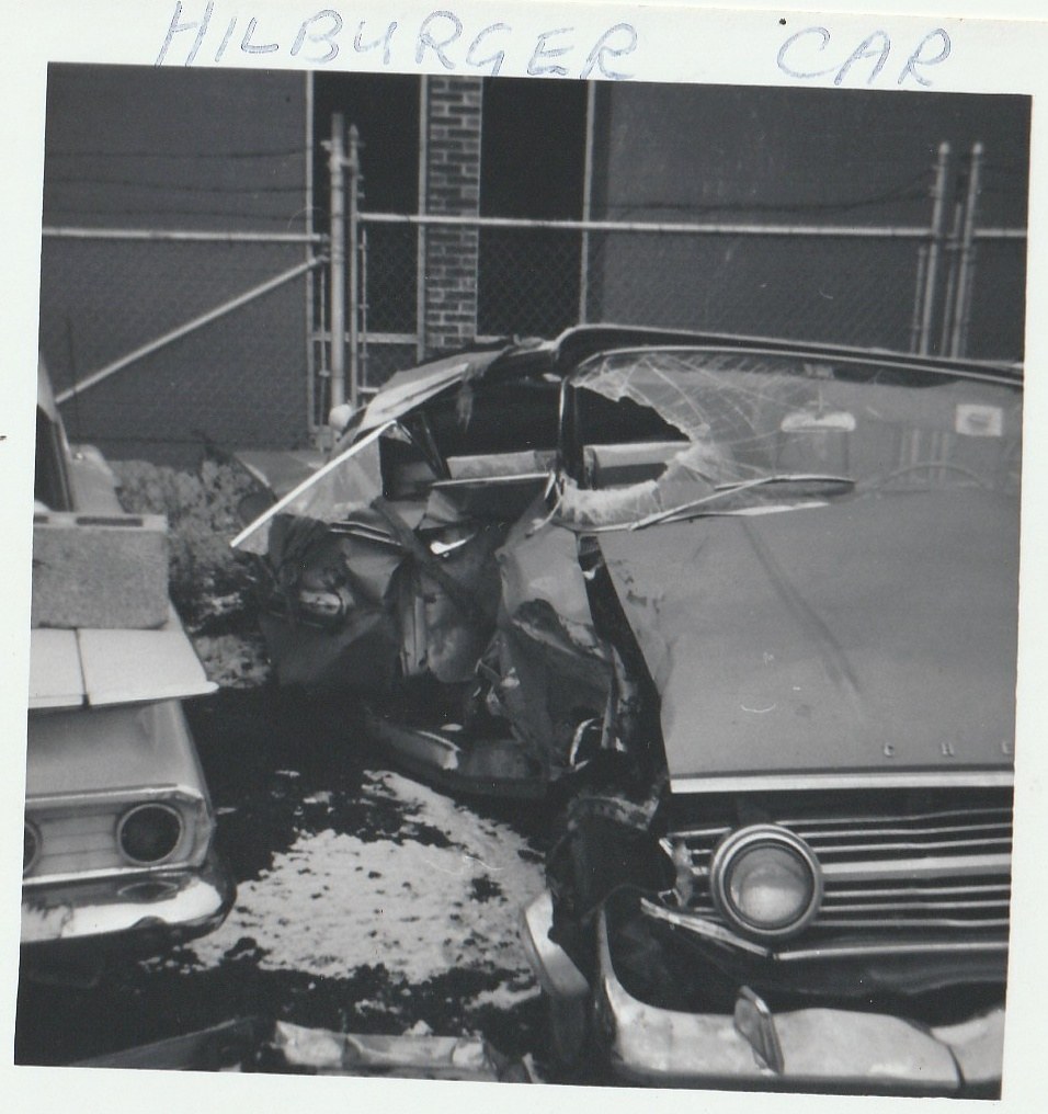 Rosa's wrecked car, side view