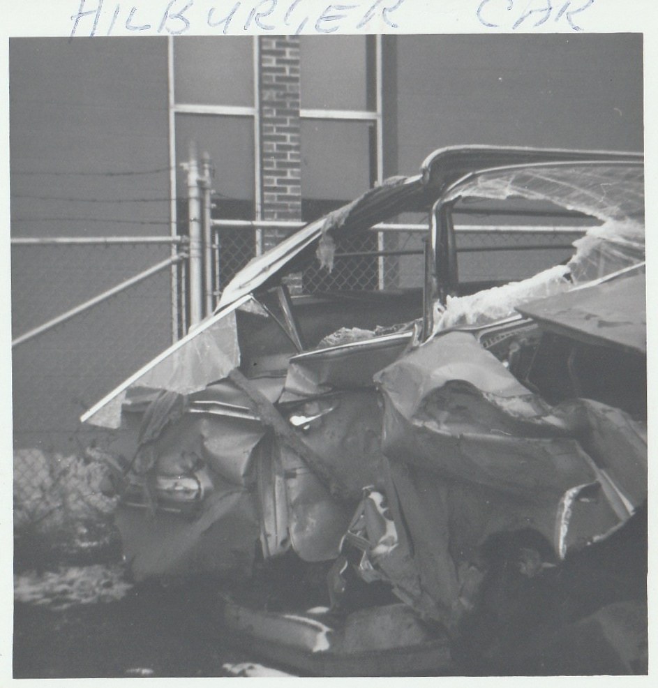Rosa's wrecked car, rear view