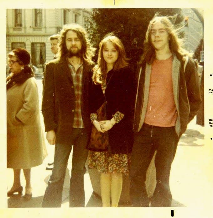Pam, Derek, and Larry on a city street, April 1972