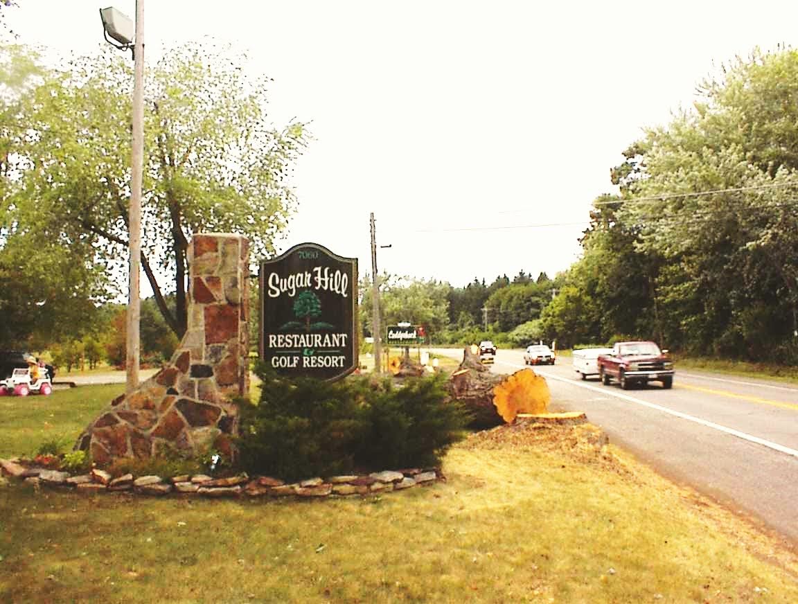 The Sugar Hill Golf Course sign