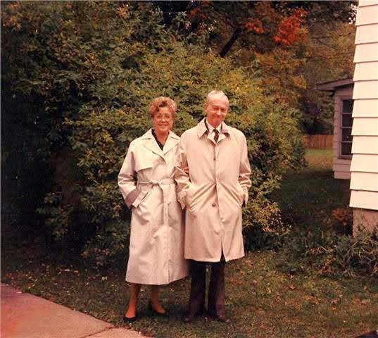 Rosa and Edwin Hilburger standing together in the yard
