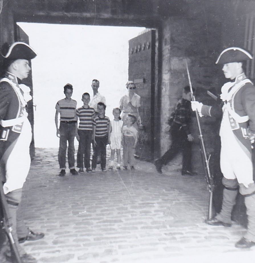 The family at a fort with colonial reenactors